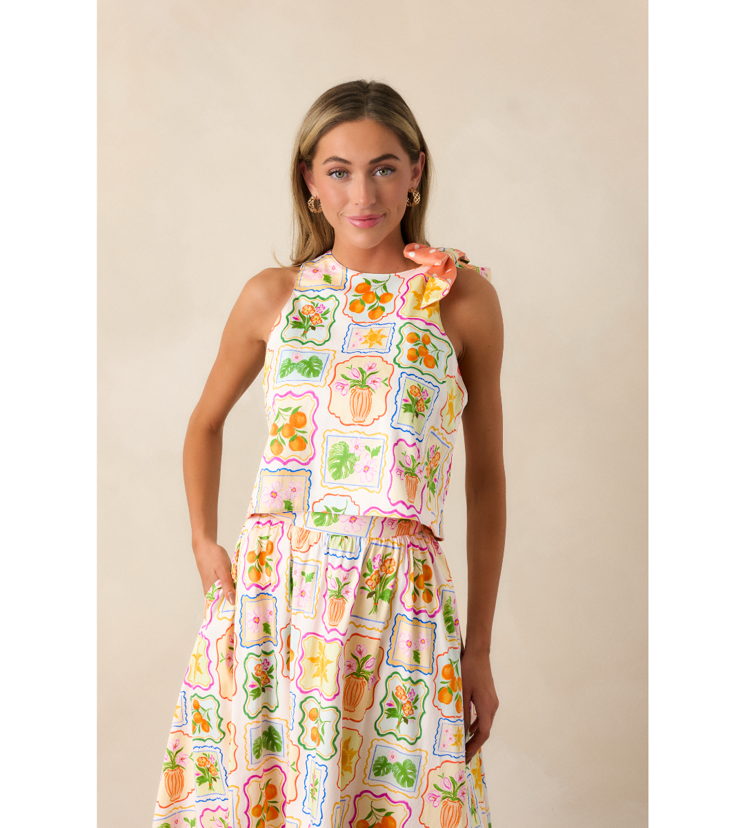 prosperina sinclair reversible sleeveless tie top fruit print crop