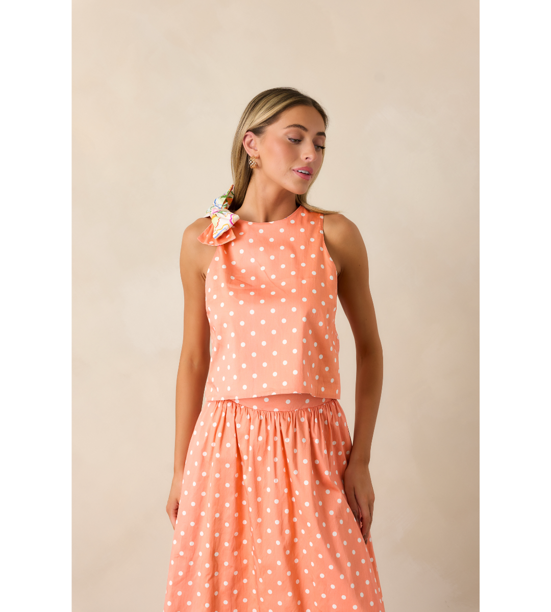 prosperina sinclair reversible sleeveless tie top polka dot crop